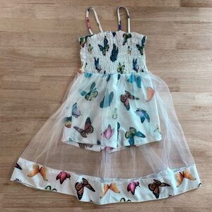 Butterfly Print White Dress with shorts underneath mesh overlay.